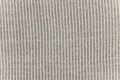 A fabric swatch of a knit baby swaddle.